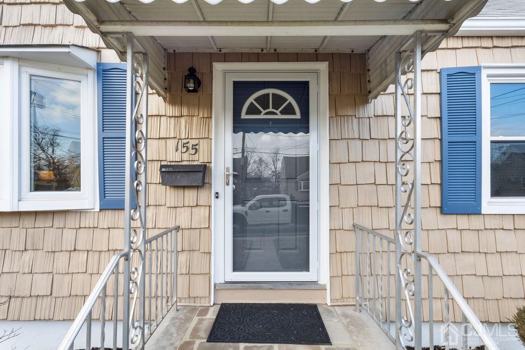 155 East Hill Road Colonia, NJ 07067 - Photo 5 of 37 a front view of a house with a shower