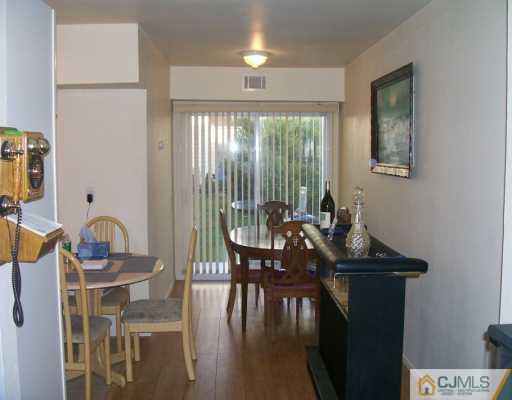 47 Haven Road Old Bridge, NJ 08857 - Photo 6 of 8 a view of a dining room with furniture window and outside view