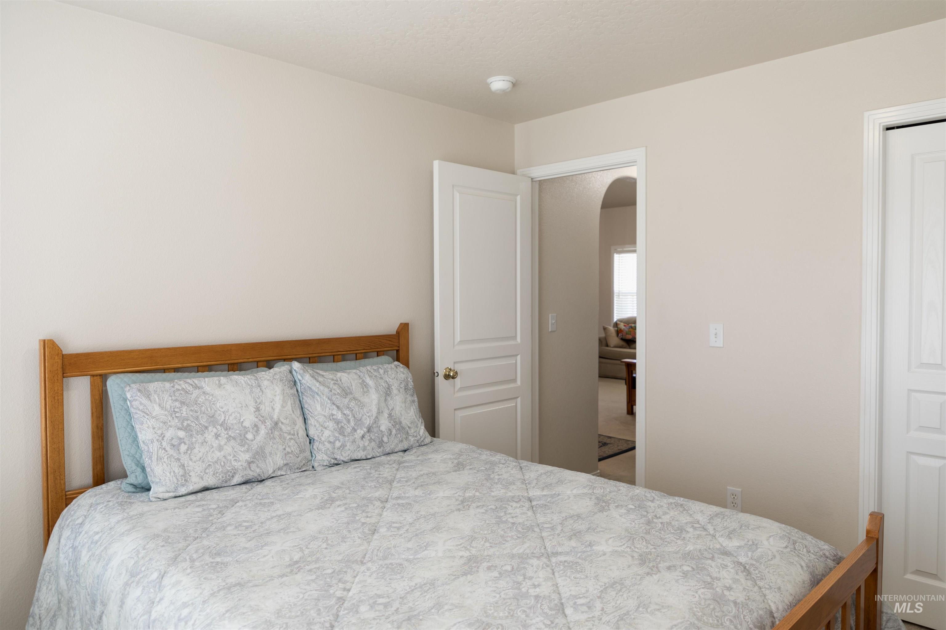 1003 Partridge Street Fruitland, ID 83619 - Photo 10 of 48 Bedroom featuring arched walkways