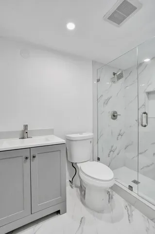 a view of a room with racks on the wall