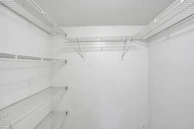 a view of a room with racks on the wall