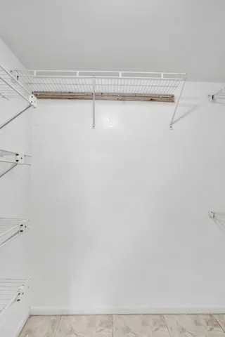 a view of a balcony with an outdoor space