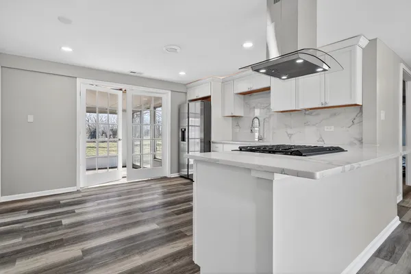a kitchen with a sink and cabinets