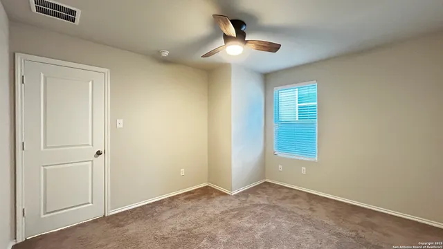 an empty room that has a window