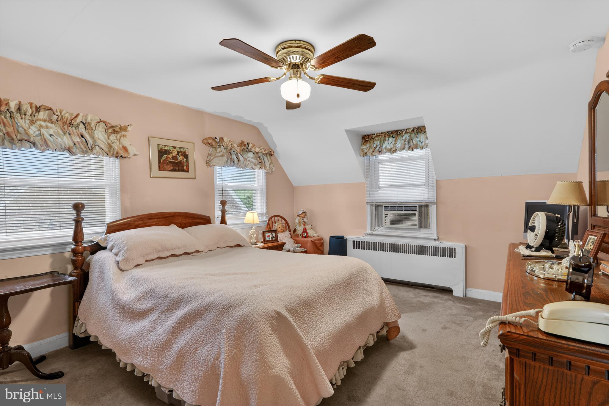 1424 Burmont Road Havertown, PA 19083 - Photo 20 of 37 a bedroom with a bed and a large window