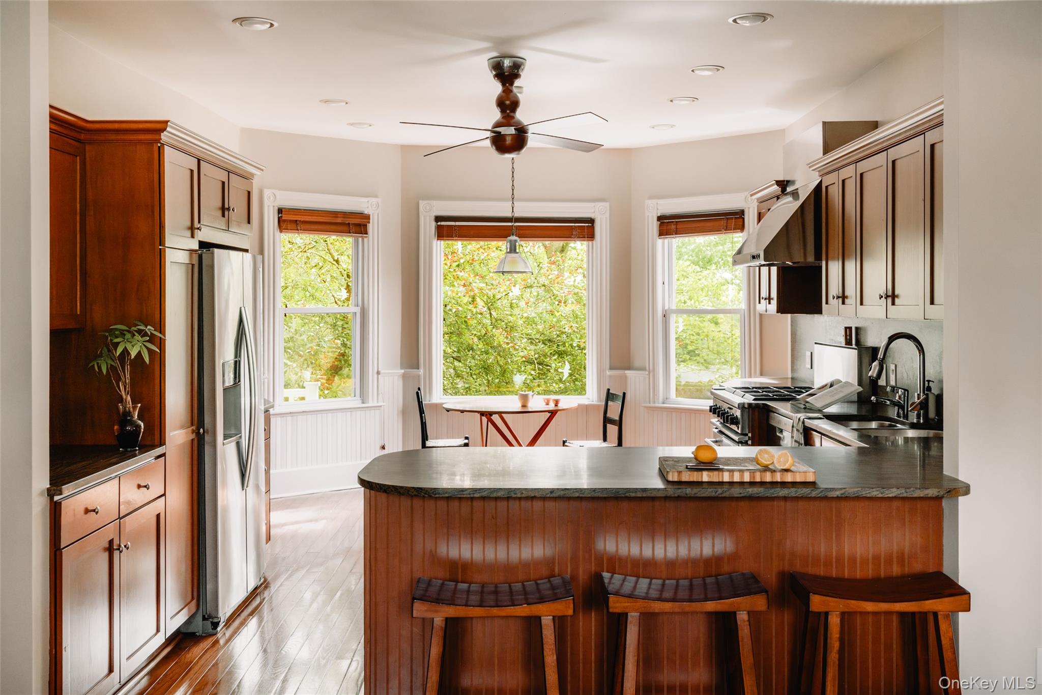 111 Jim Stephenson Road Jeffersonville, NY 12748 - Photo 12 of 50 a kitchen with a stove a sink and a refrigerator