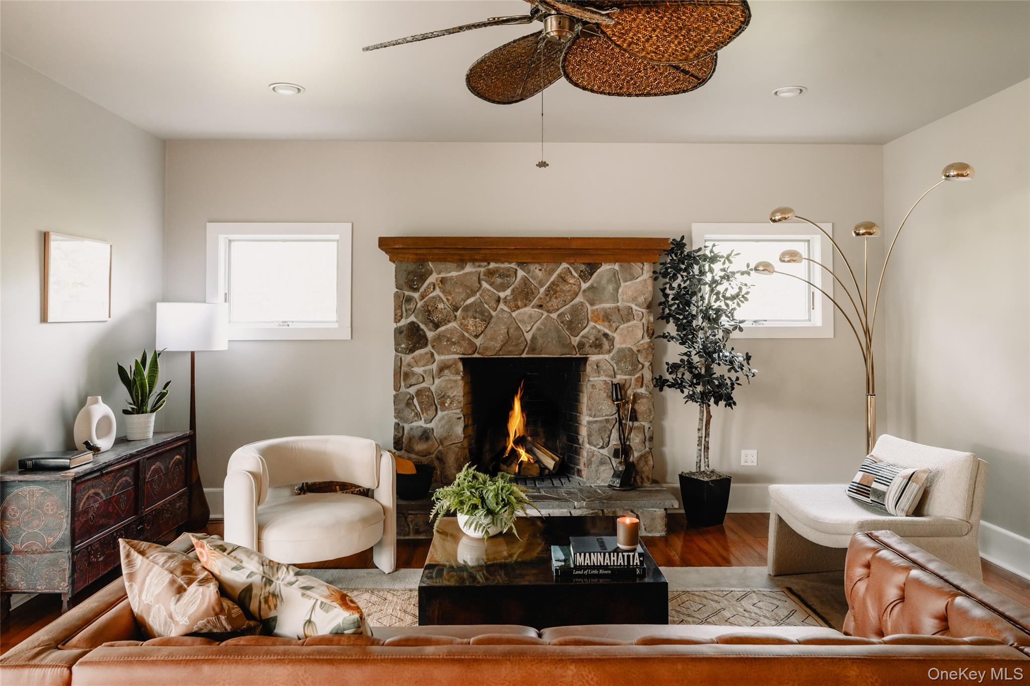 111 Jim Stephenson Road Jeffersonville, NY 12748 - Photo 16 of 50 a living room with furniture and a fireplace