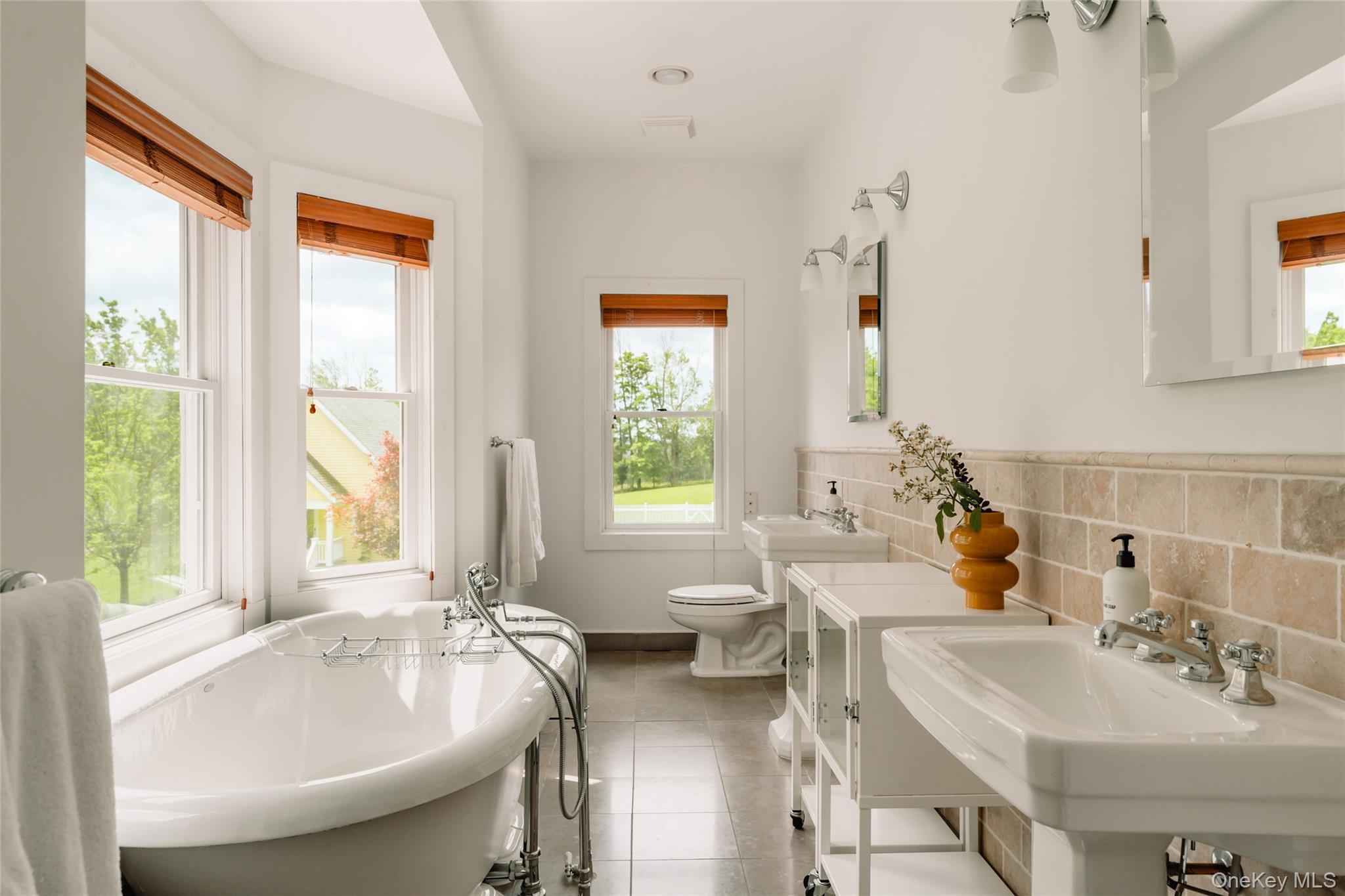 111 Jim Stephenson Road Jeffersonville, NY 12748 - Photo 21 of 50 a spacious bathroom with sink and bathtub