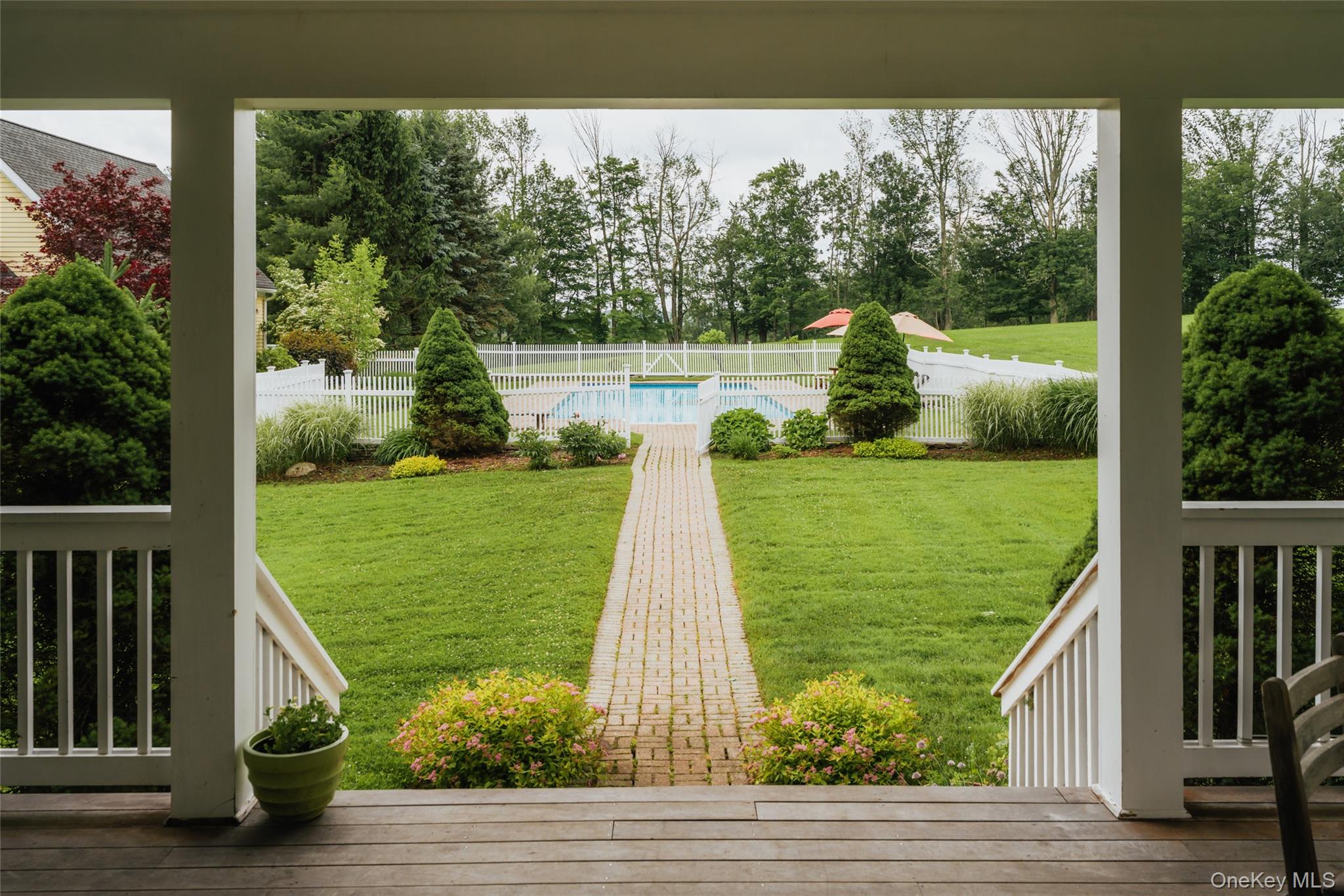 111 Jim Stephenson Road Jeffersonville, NY 12748 - Photo 29 of 50 a view of a wooden deck and yard with green space