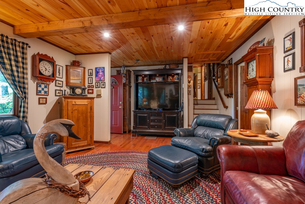 307 Lakeview Road Newland, NC 28657 - Photo 14 of 49 a outdoor living space with furniture and a flat screen tv