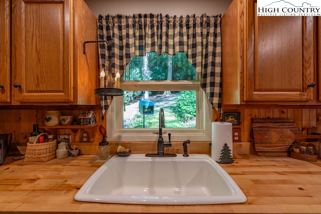 307 Lakeview Road Newland, NC 28657 - Photo 15 of 49 a view of a kitchen with kitchen island a window and a sink