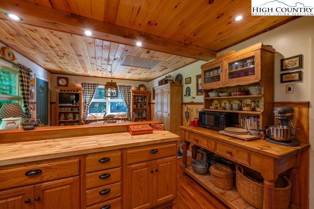 307 Lakeview Road Newland, NC 28657 - Photo 20 of 49 a open kitchen with stainless steel appliances granite countertop a stove and a sink