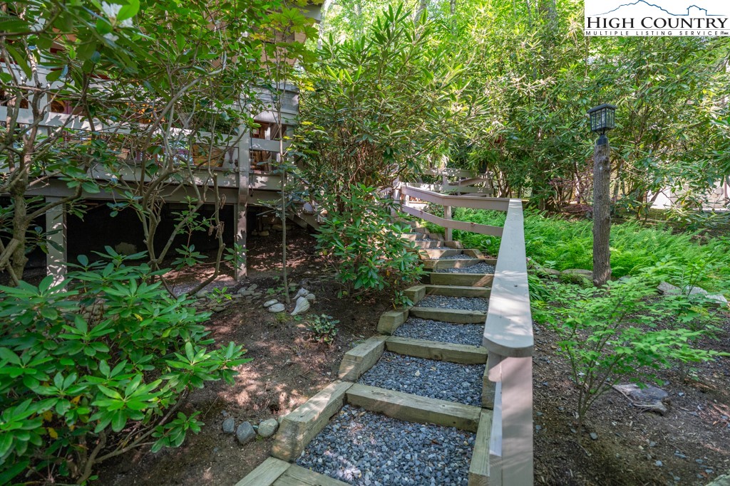 307 Lakeview Road Newland, NC 28657 - Photo 49 of 49 a view of a garden with large trees