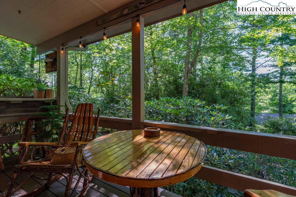 307 Lakeview Road Newland, NC 28657 - Photo 10 of 49 a view of a two chairs in the balcony