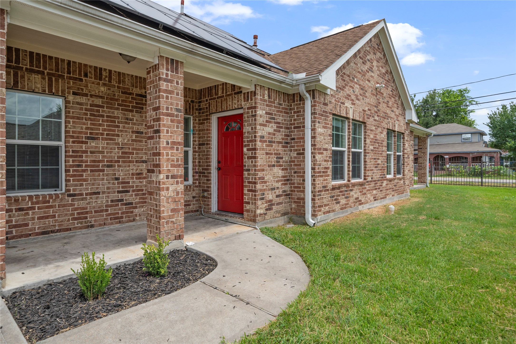 3001 Wayne Street Houston, TX 77026 - Photo 5 of 31 Side entrance from the garage, with a covered breezeway
