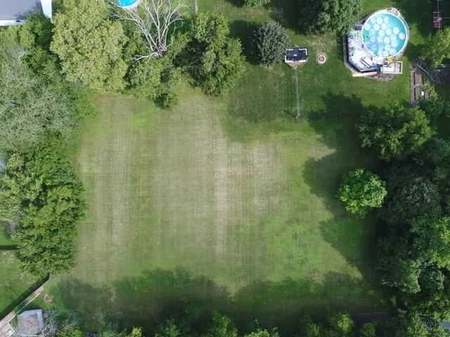 a bathroom with a toilet and window
