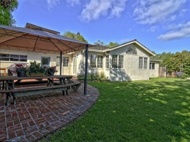 651 Covington Road Los Altos, CA 94024 - Photo 3 of 21 a front view of a house with garden