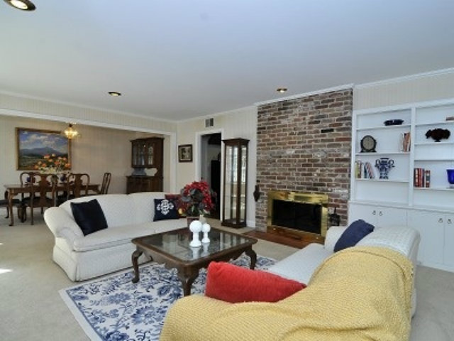 651 Covington Road Los Altos, CA 94024 - Photo 4 of 21 a living room with furniture and a fireplace