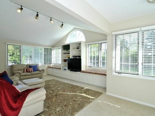 651 Covington Road Los Altos, CA 94024 - Photo 7 of 21 a living room with furniture and a large window