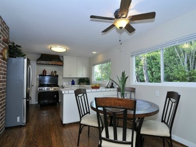 651 Covington Road Los Altos, CA 94024 - Photo 8 of 21 a view of a dining room with furniture window and wooden floor