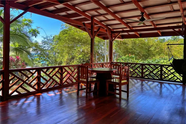 a kitchen with sink a window and outdoor space
