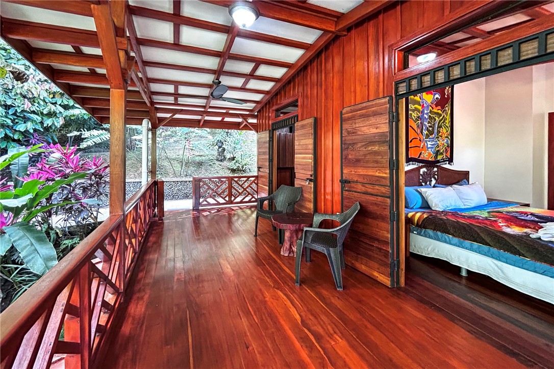 0 Drake Bay Costa Rica Out Of Area, OS 00000 - Photo 14 of 36 a balcony with wooden floor