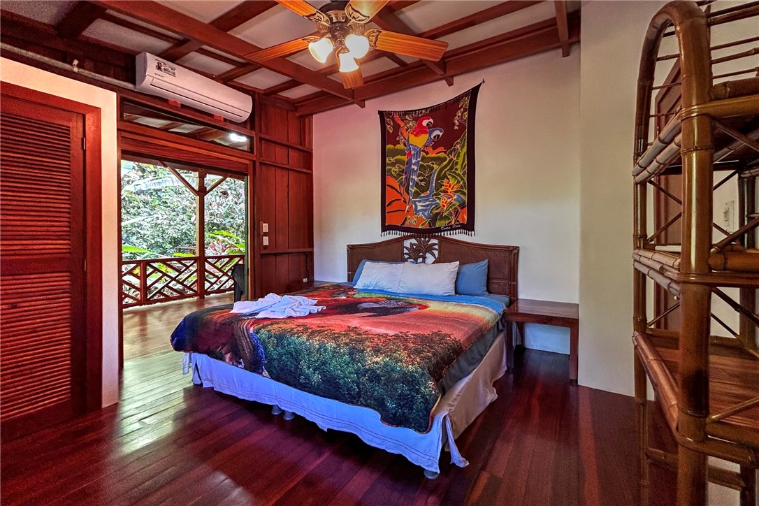 0 Drake Bay Costa Rica Out Of Area, OS 00000 - Photo 15 of 36 a bed sitting in a bedroom next to a window