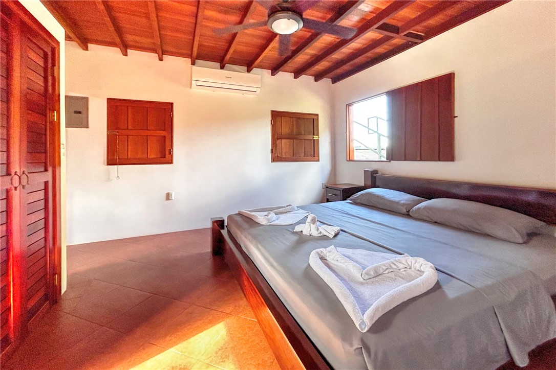 0 Drake Bay Costa Rica Out Of Area, OS 00000 - Photo 19 of 36 a bedroom with a bed and a window