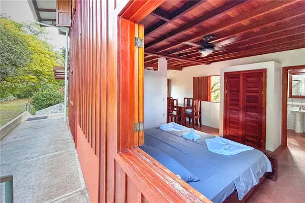 a bedroom with a bed and a closet