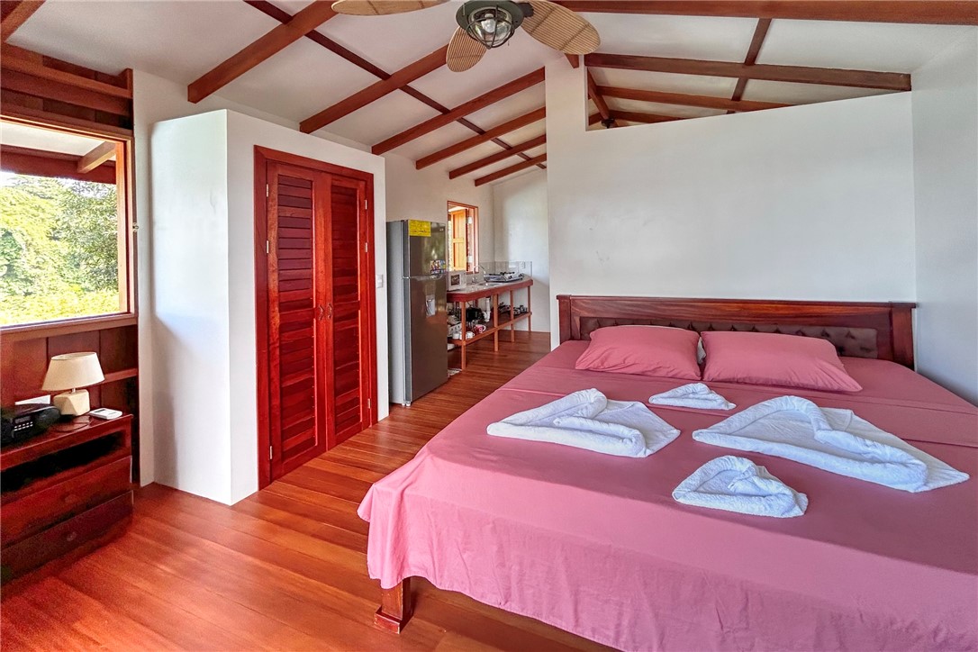 0 Drake Bay Costa Rica Out Of Area, OS 00000 - Photo 23 of 36 a bedroom with a bed and a closet