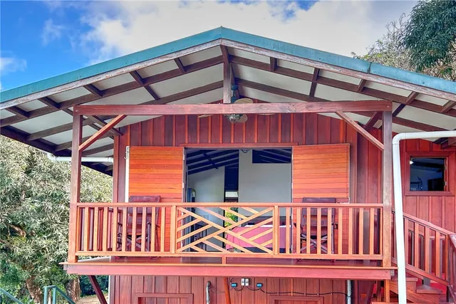 a view of balcony with wooden floor
