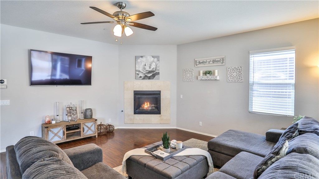 12179 Dewar Drive Riverside, CA 92505 - Photo 9 of 28 a living room with furniture and a window