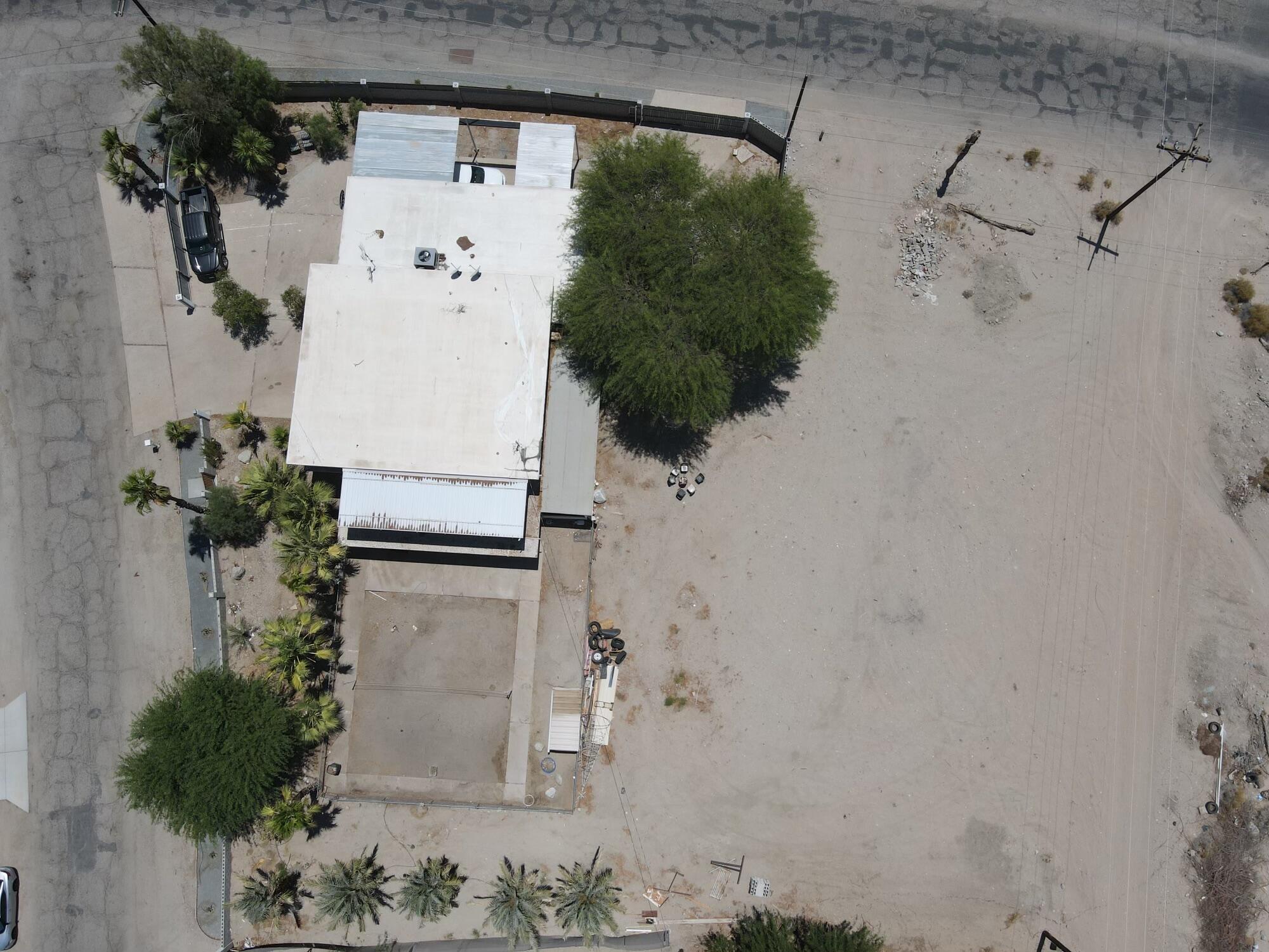 1498 Nile Drive Thermal, CA 92274 - Photo 103 of 108 an aerial view of a house with a yard and garden