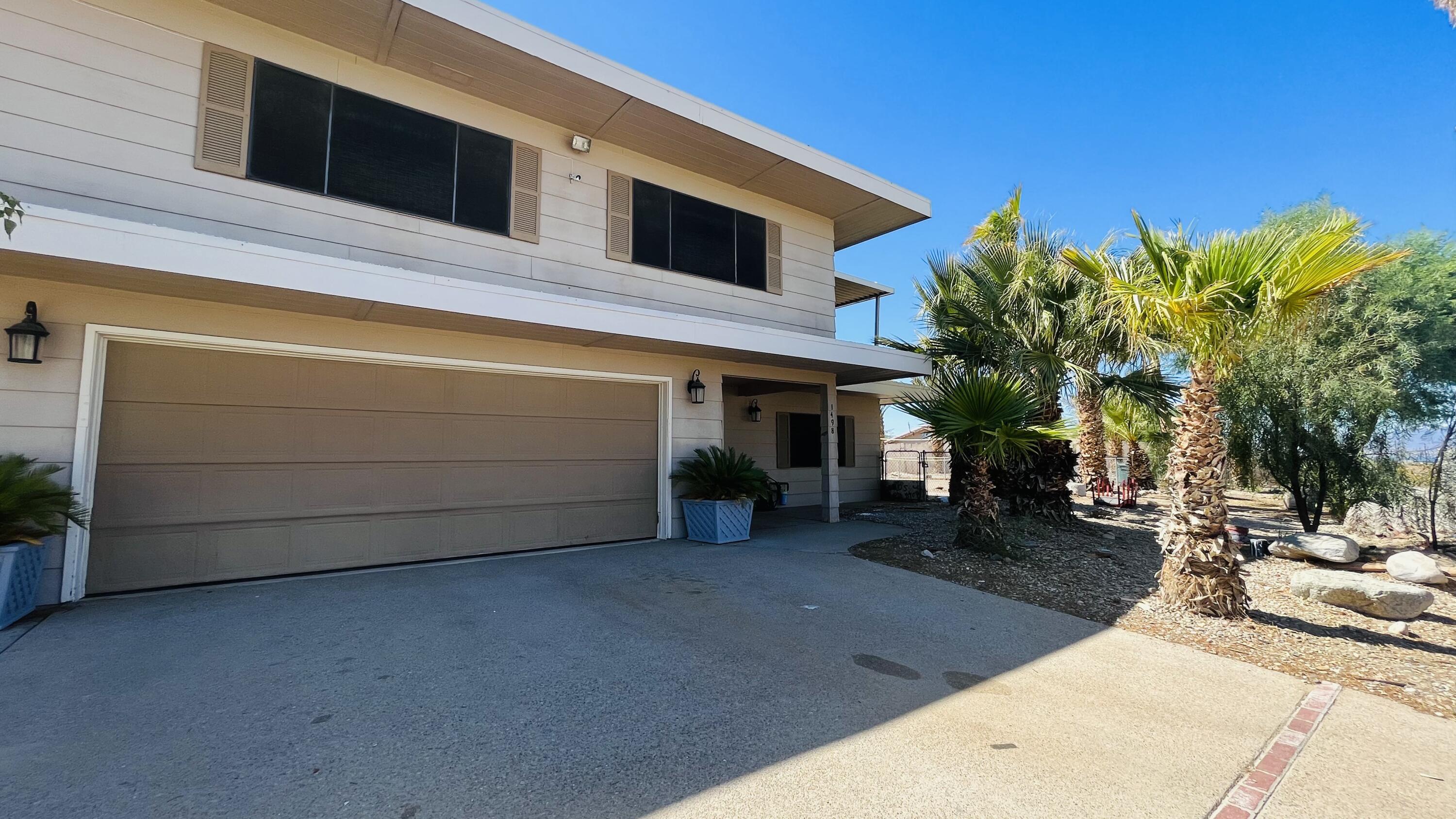 1498 Nile Drive Thermal, CA 92274 - Photo 15 of 108 a view of a house with a patio