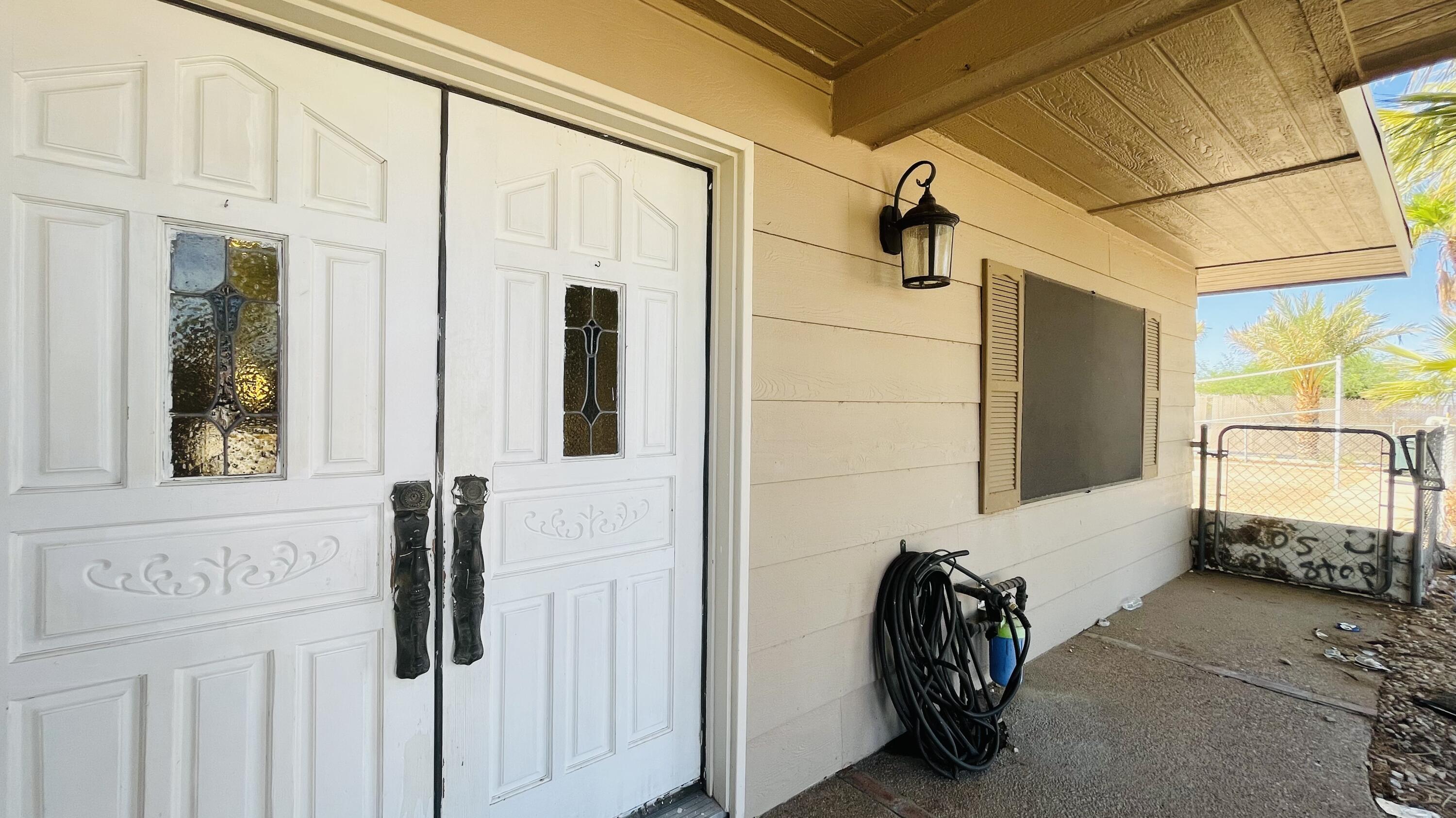 1498 Nile Drive Thermal, CA 92274 - Photo 22 of 108 a view of a entryway door of the house