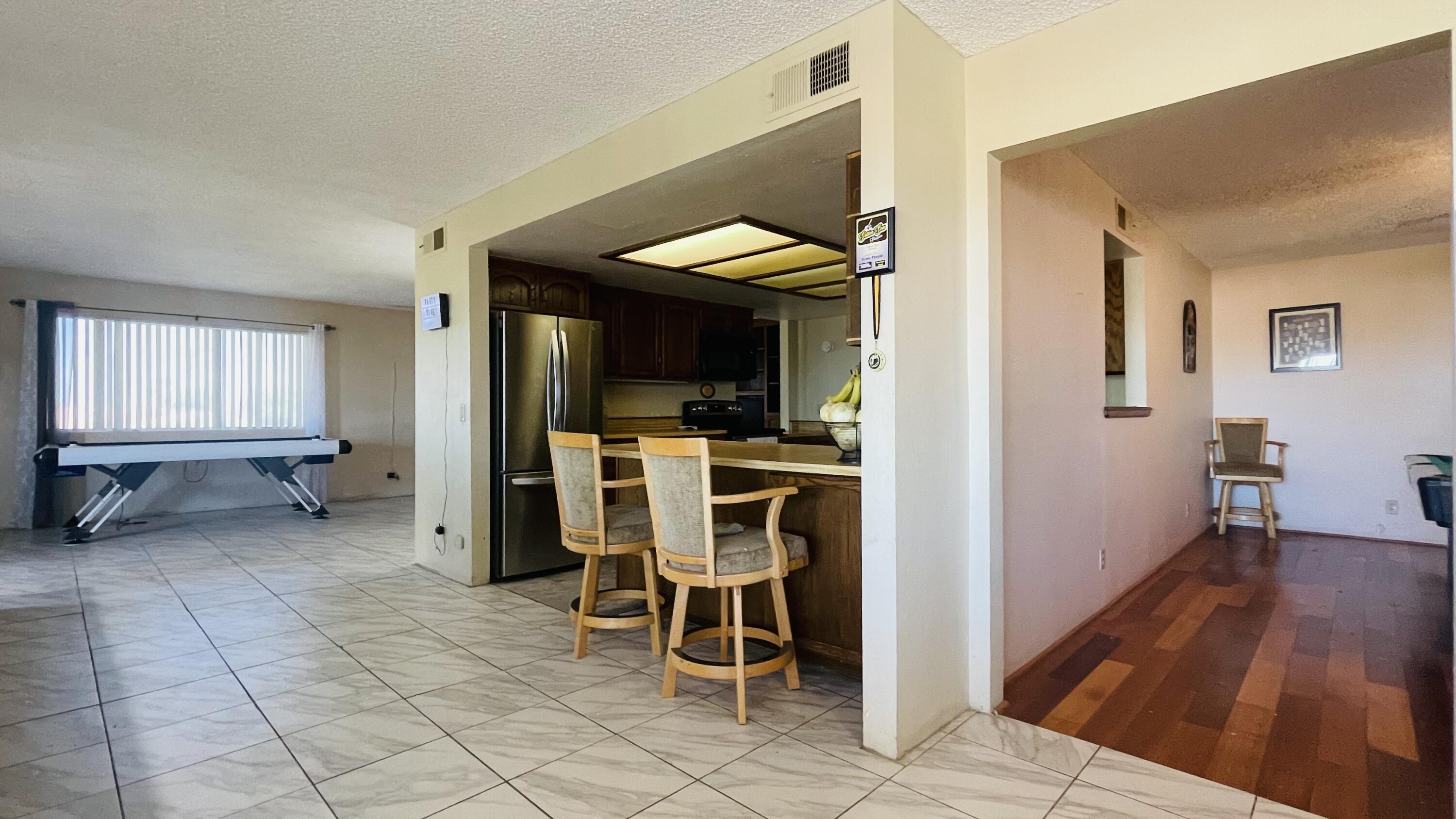 1498 Nile Drive Thermal, CA 92274 - Photo 30 of 108 a dining room with furniture and entryway