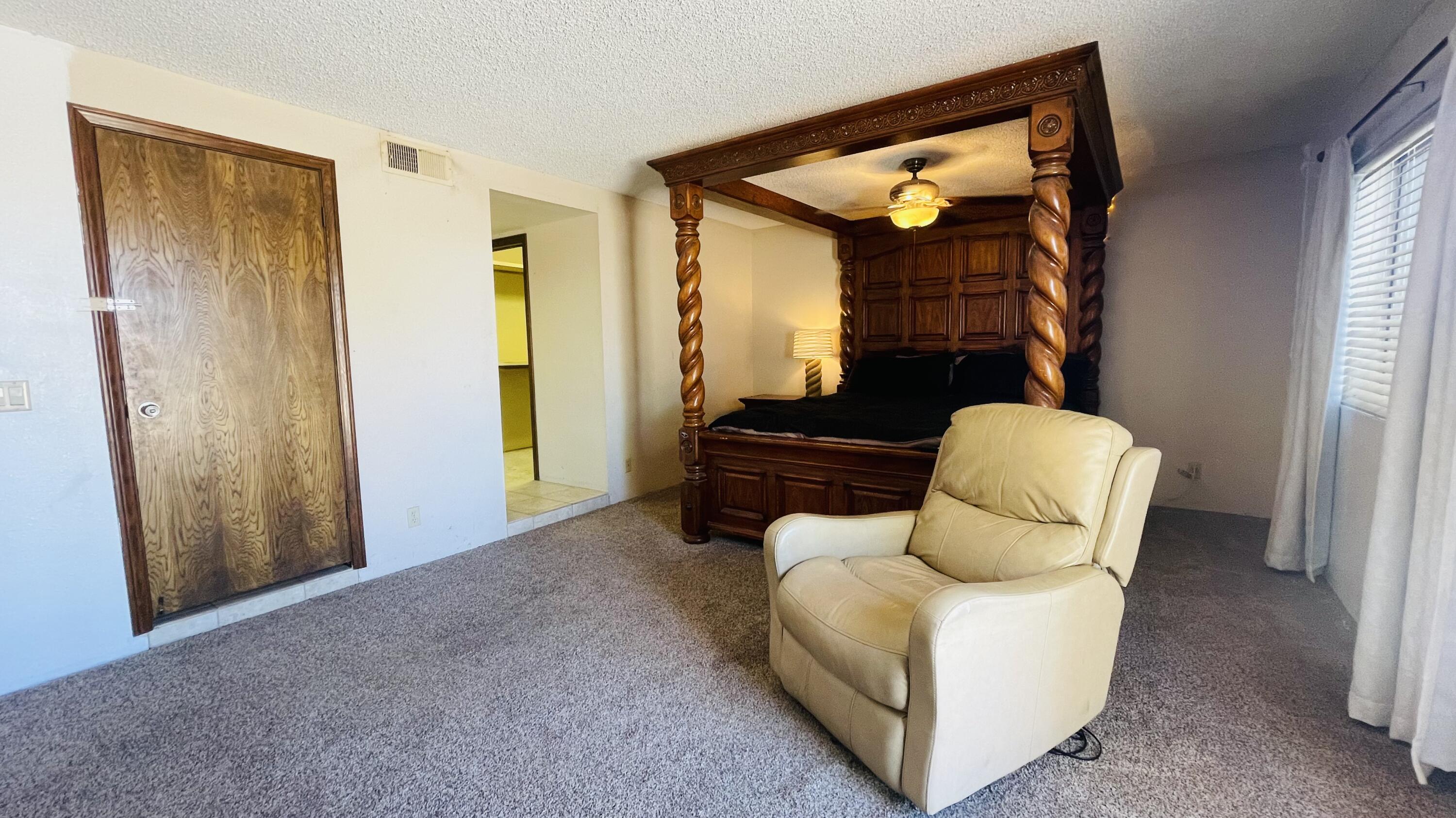 1498 Nile Drive Thermal, CA 92274 - Photo 58 of 108 a living room with furniture and a mirror