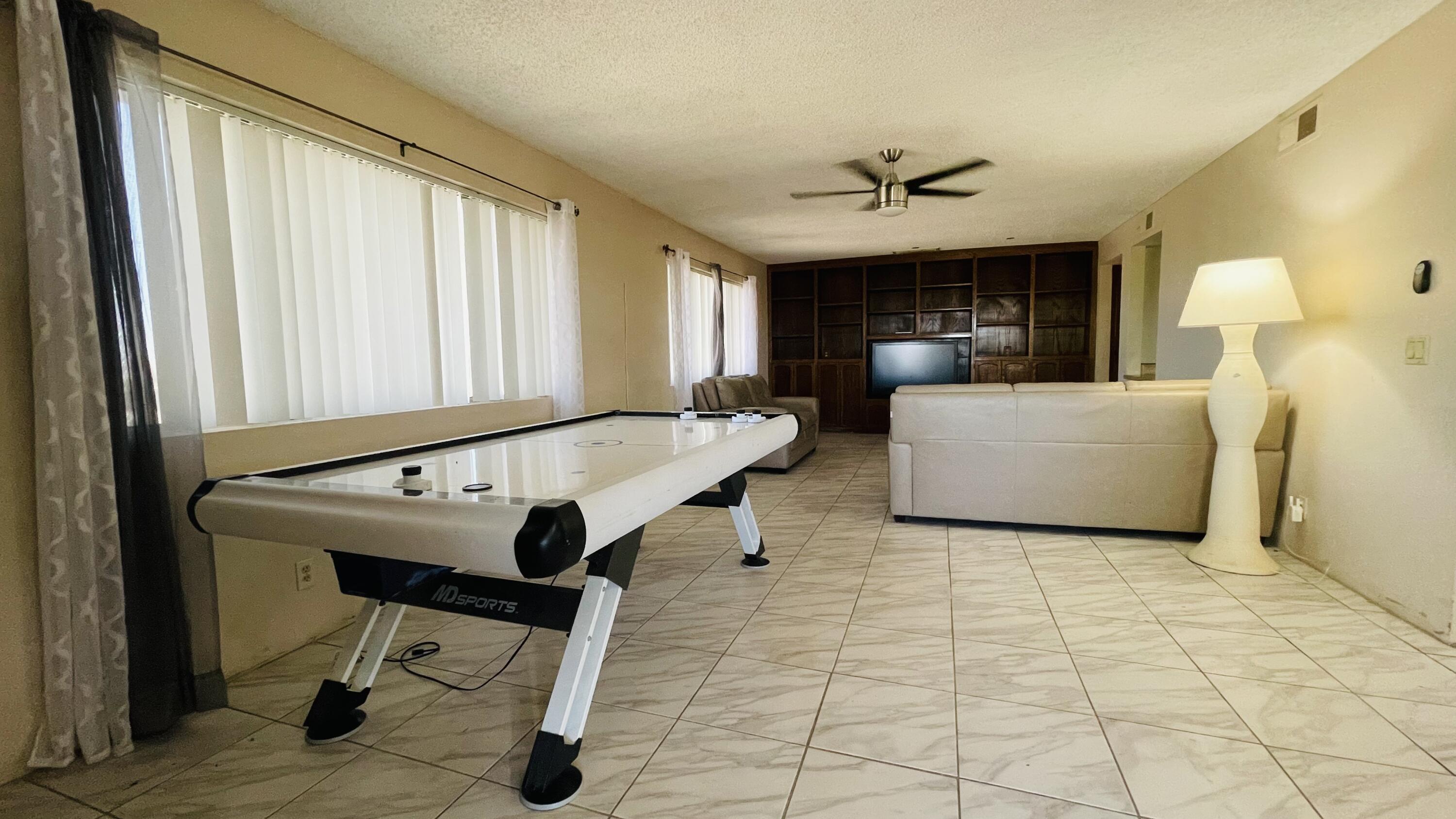 1498 Nile Drive Thermal, CA 92274 - Photo 72 of 108 a living room with furniture and a large window
