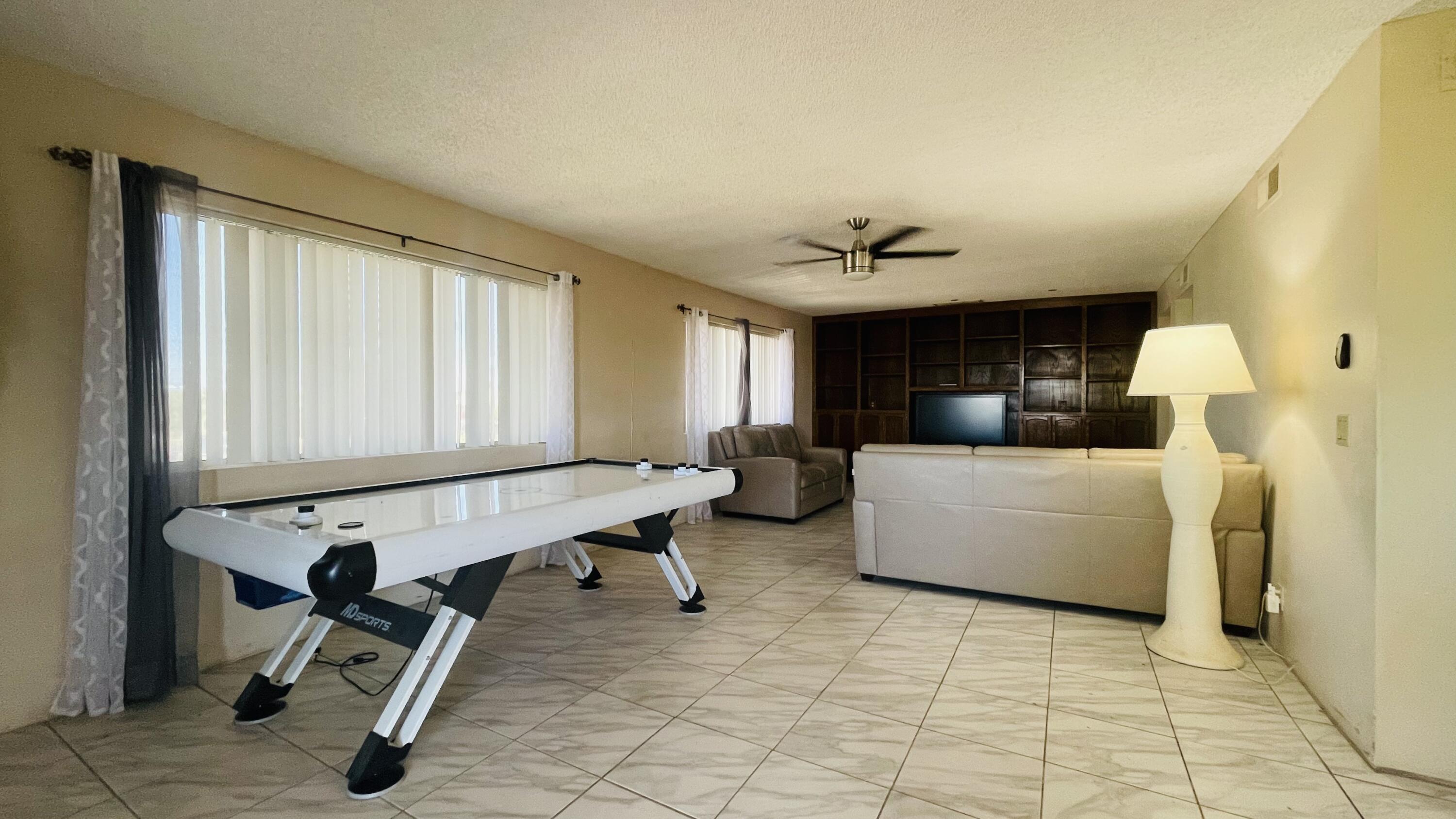 1498 Nile Drive Thermal, CA 92274 - Photo 75 of 108 a living room with furniture and a window