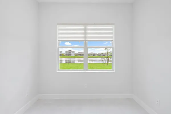 a kitchen with a sink cabinets and appliances