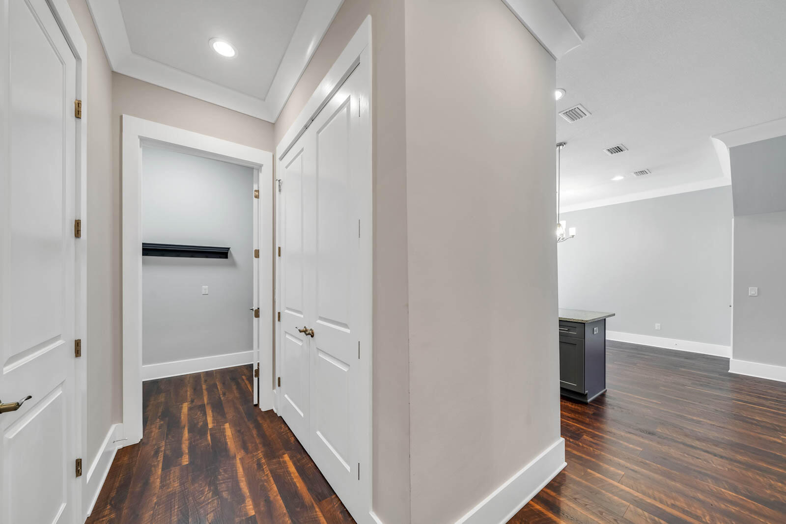 995 Airport Road, Unit 39 Destin, FL 32541 - Photo 13 of 37 a view of hallway with wooden floor