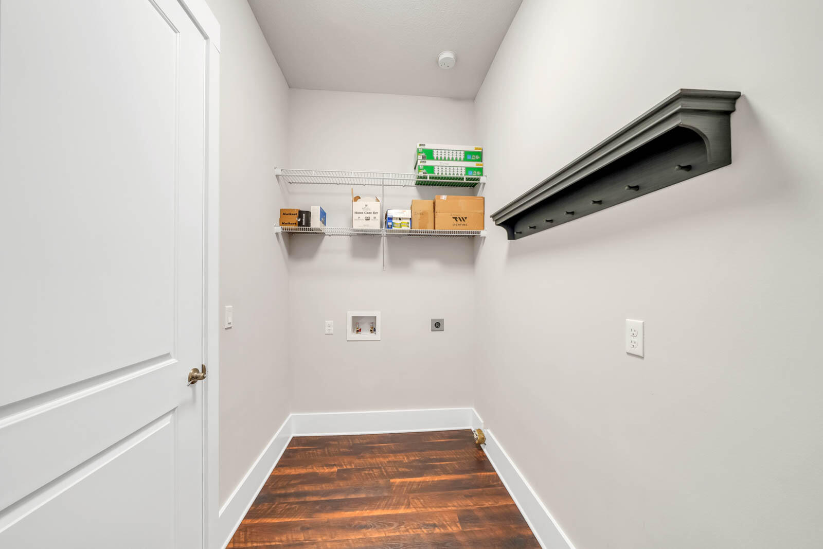 995 Airport Road, Unit 39 Destin, FL 32541 - Photo 14 of 37 a view of a hallway with wooden floor and staircase