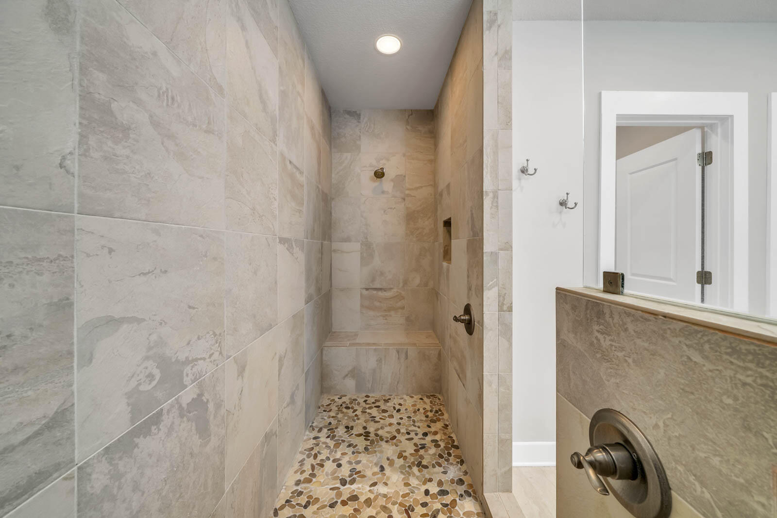 995 Airport Road, Unit 39 Destin, FL 32541 - Photo 19 of 37 a bathroom with a shower