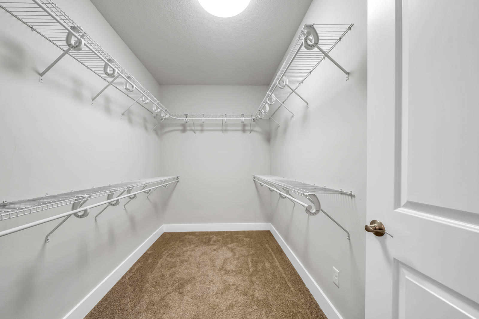 995 Airport Road, Unit 39 Destin, FL 32541 - Photo 20 of 37 a view of a hallway with stairs