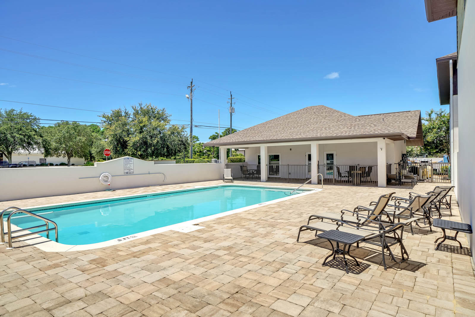 995 Airport Road, Unit 39 Destin, FL 32541 - Photo 2 of 37 a view of a house with swimming pool and sitting area