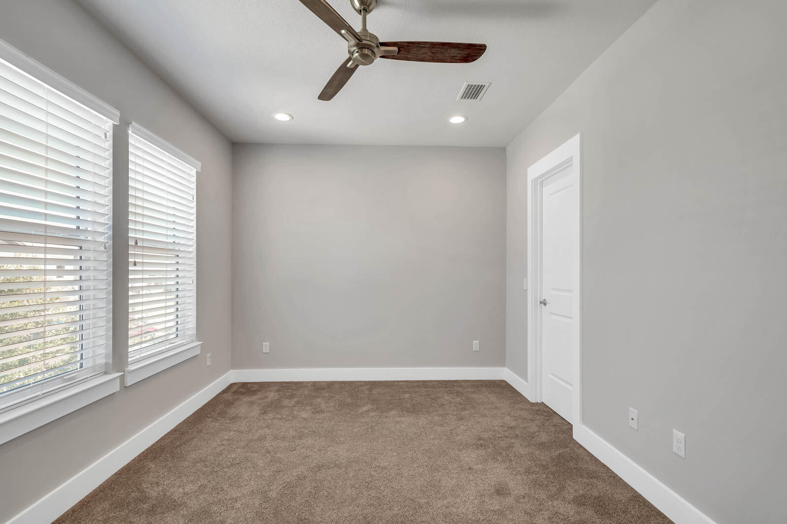 995 Airport Road, Unit 39 Destin, FL 32541 - Photo 22 of 37 a view of a livingroom with a ceiling fan and window