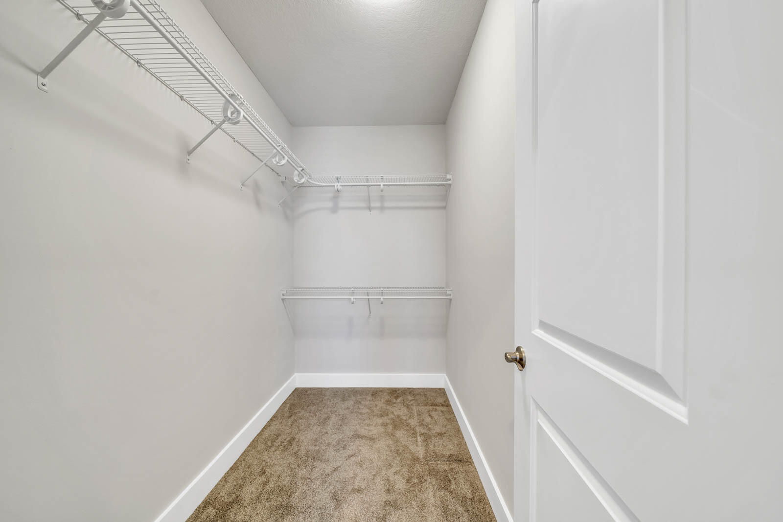 995 Airport Road, Unit 39 Destin, FL 32541 - Photo 24 of 37 a view of a room with racks on the wall