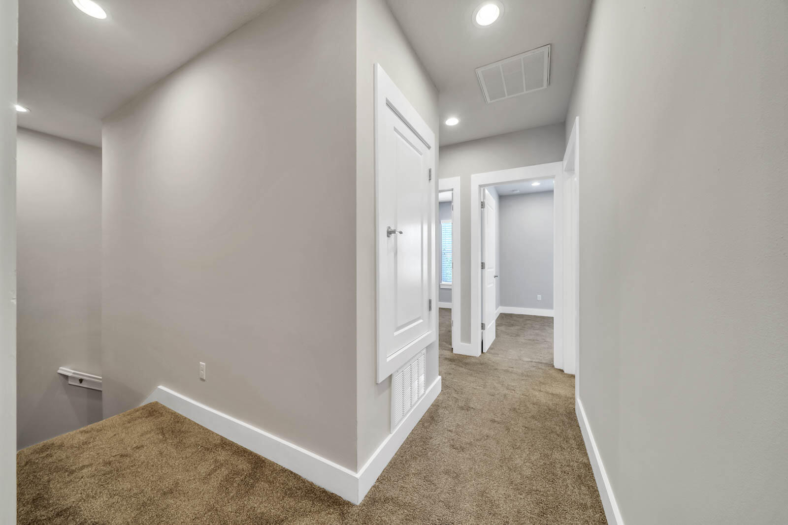 995 Airport Road, Unit 39 Destin, FL 32541 - Photo 30 of 37 a view of a hallway with wooden floor and closet