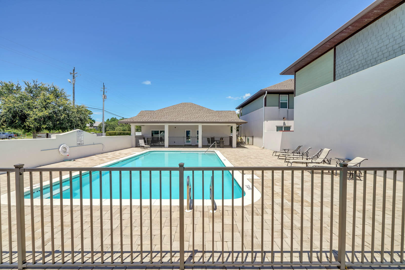 995 Airport Road, Unit 39 Destin, FL 32541 - Photo 35 of 37 a front view of a house with a porch
