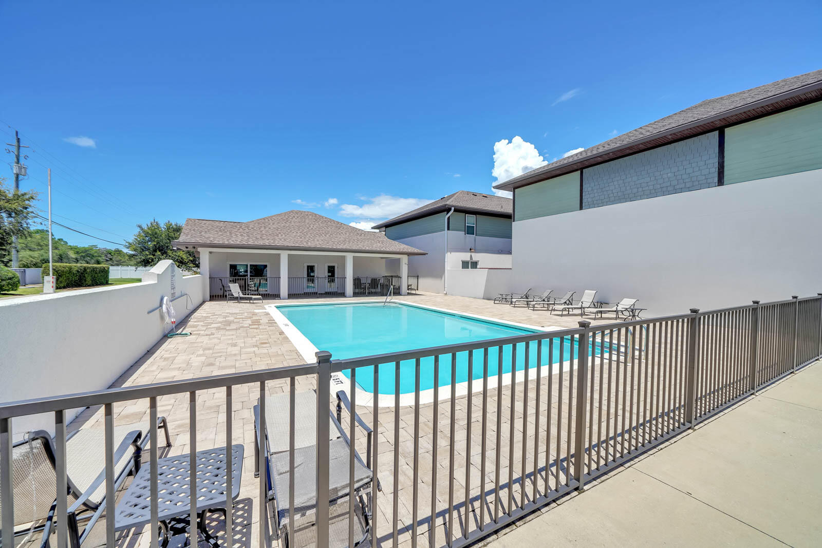 995 Airport Road, Unit 39 Destin, FL 32541 - Photo 36 of 37 a balcony view with a garden space